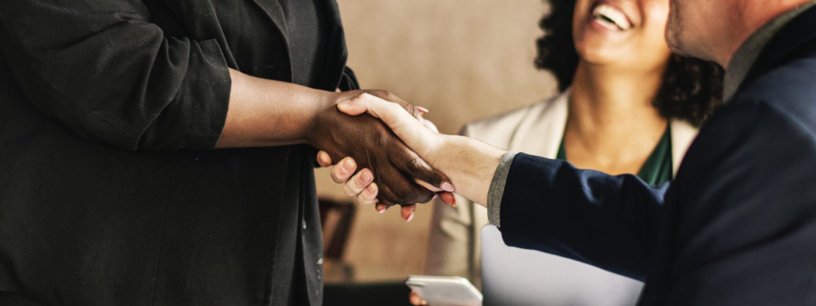 Man shaking hands with the lady